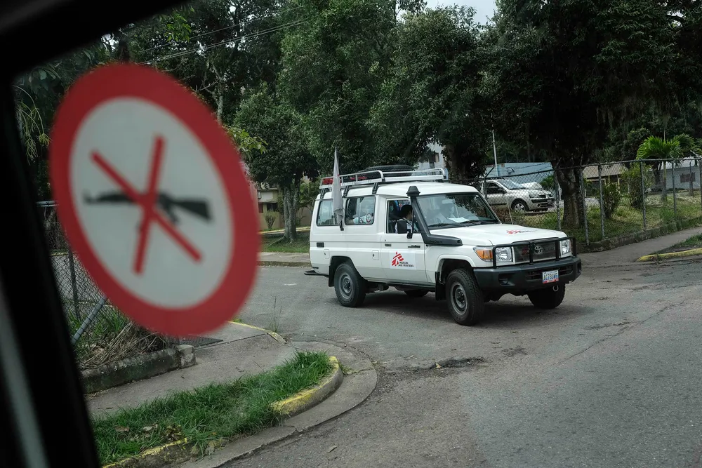 A MSF car circulates outside of the Padre Justo de Rubio Hospital
