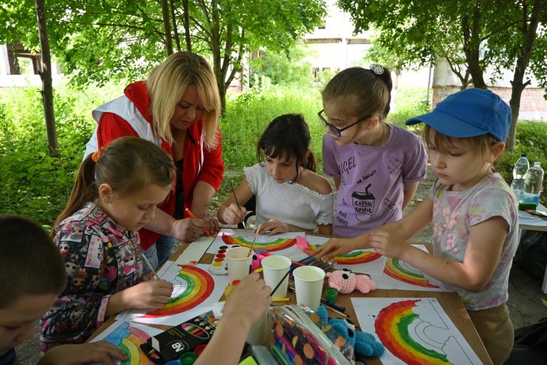 Group mental health session for children in shelter, Ukraine