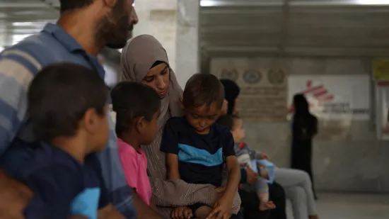 Hanan Zanoun and her three children in Nasser