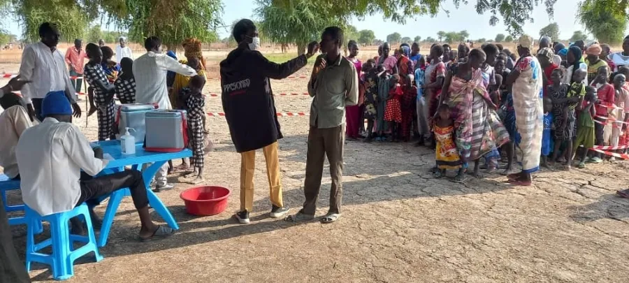 A man s receiving the cholera vaccine.