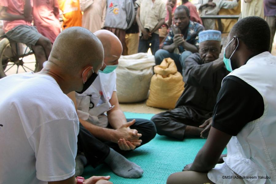 MSF team talking to a community leader in Bolori, Maiduguri