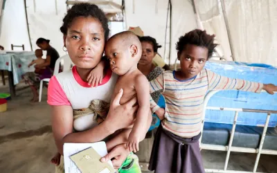 Genecia: Mother with twins