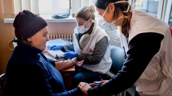 Anna Ivanivna Nefedova receiving a primary health care consultation.