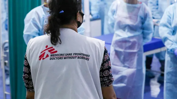 Dr Nisha Mohan explaining safety protocols